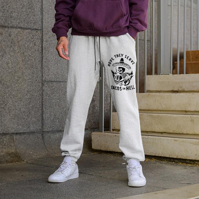 HOPE THEY SERVE TACOS IN HELL SMOKING SKULL GRAPHIC PRINT JOGGERS