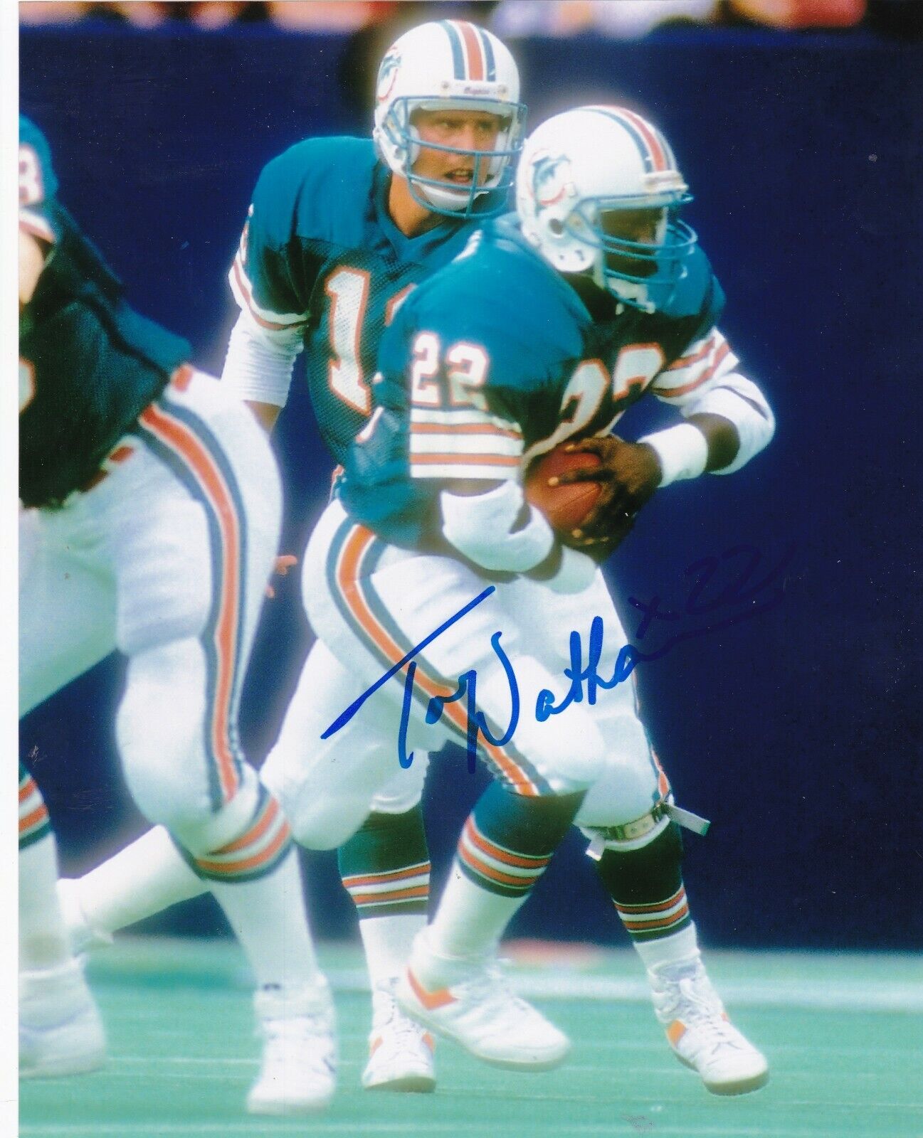 TONY NATHAN MIAMI DOLPHINS ACTION SIGNED 8x10