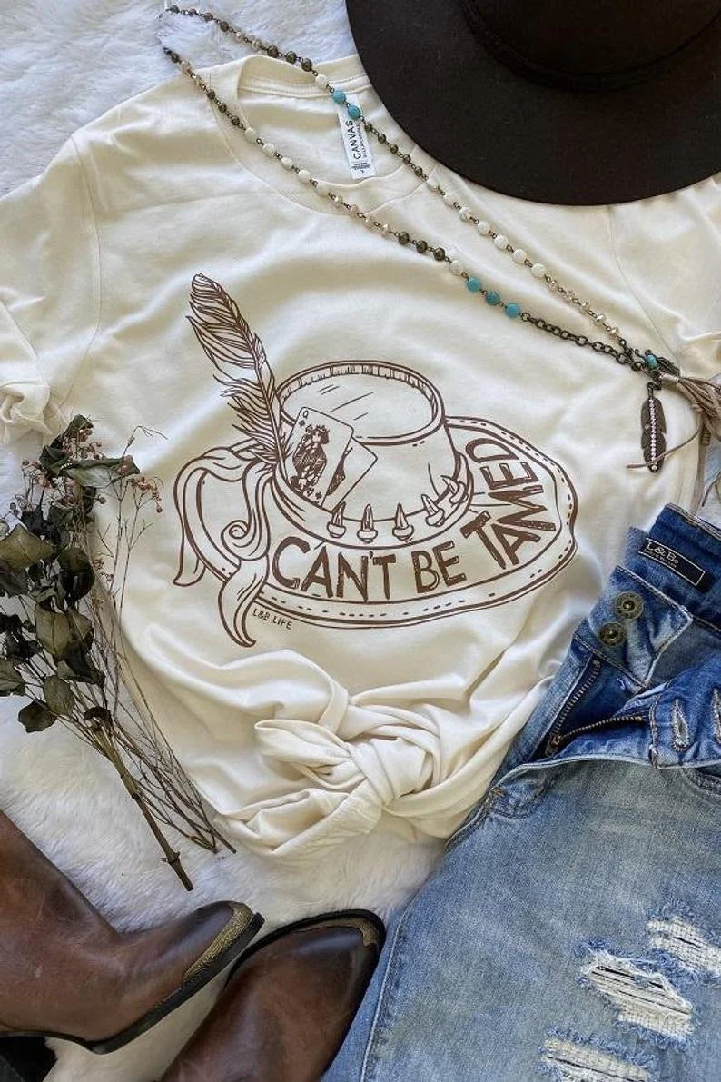 Can’t Be Tamed Tee