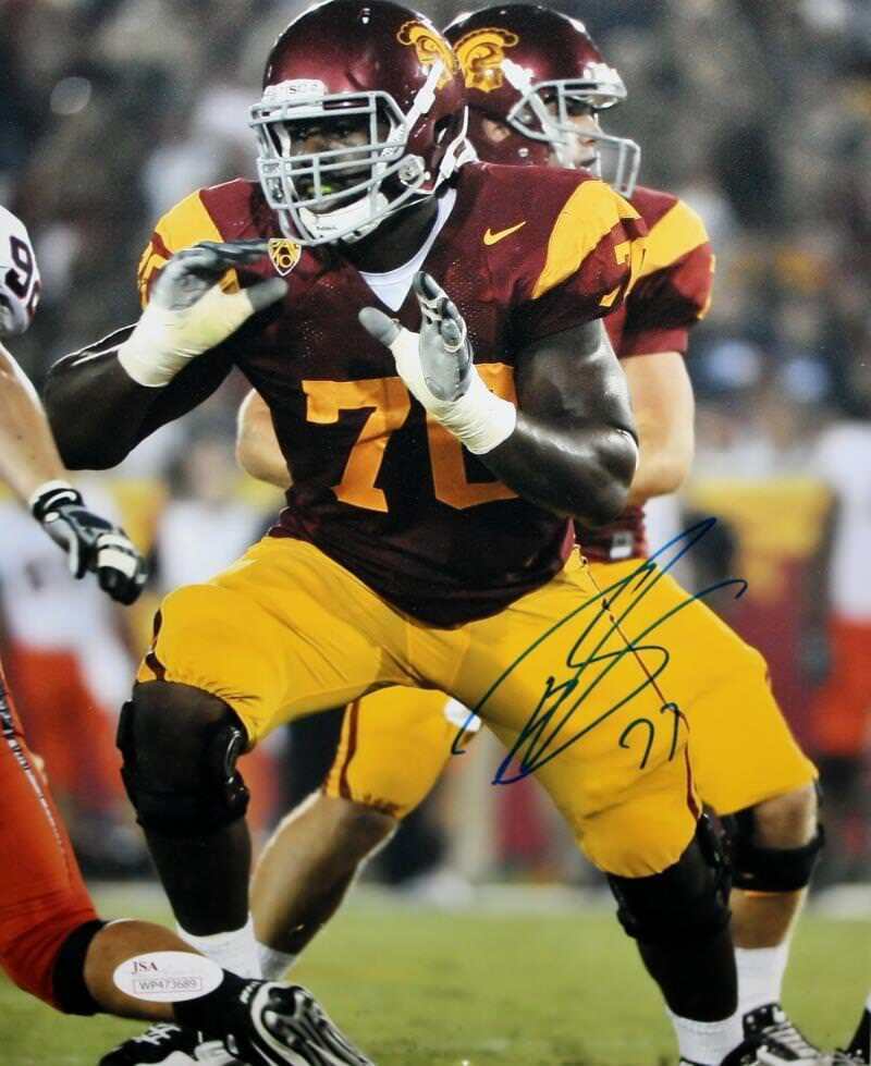 Tyron Smith Autographed 8x10 USC Trojans Maroon Jersey Photo Poster painting- JSA Witness Authen