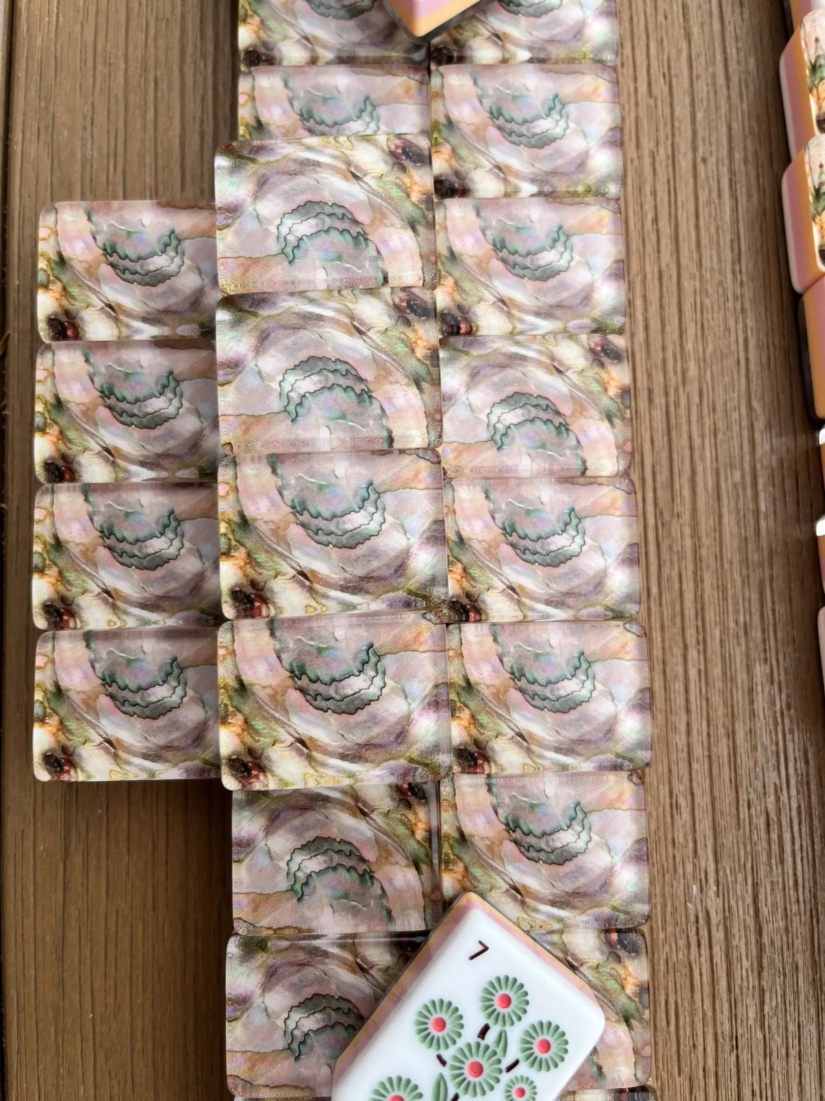 Individual authentic tiles showing faces, backs and side colors.