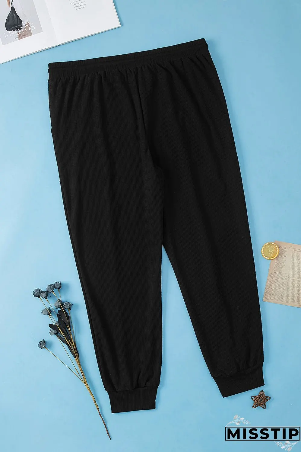 Black Plus Size Textured Exposed Seam Drawstring Jogger Pants