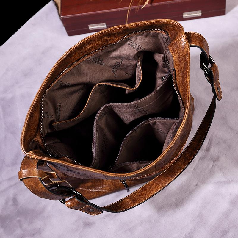 Vintage brand style single shoulder cross-arm capacity women's bag