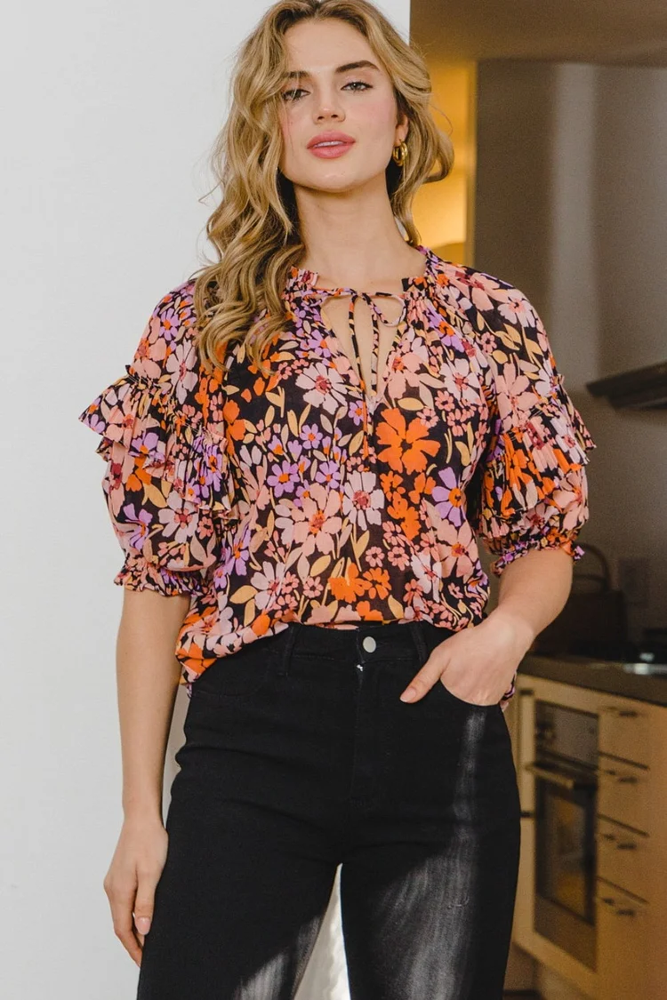 Full Size Floral Tie Neck Ruffled Blouse