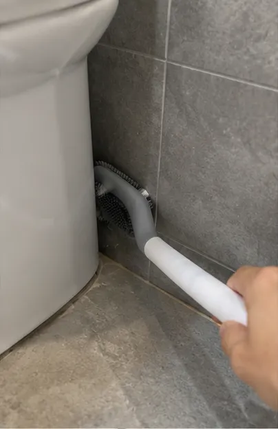 Golf Head Toilet Brush stored in a bathroom