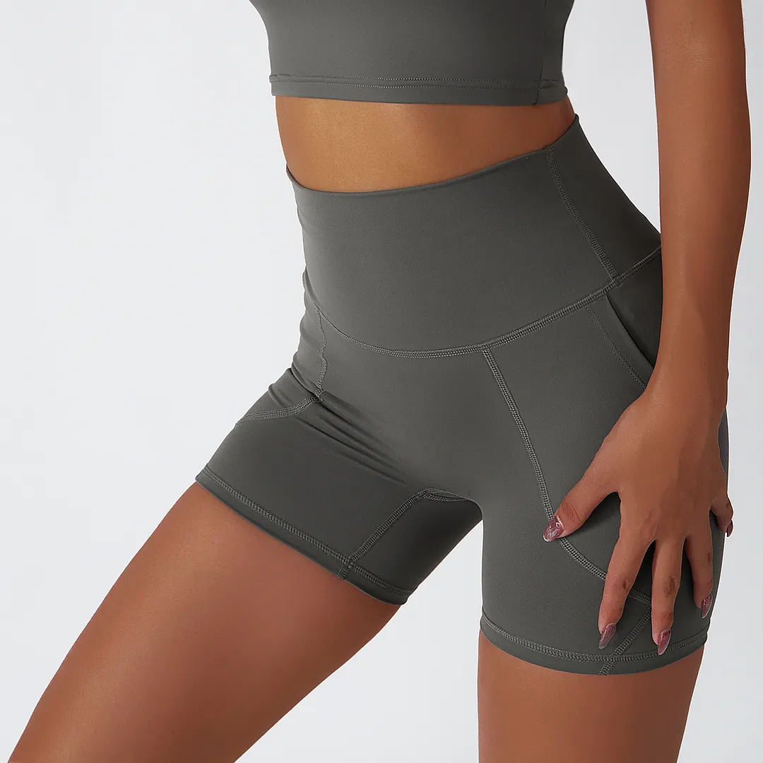 Shop Moonstone Gray renewable fabric sustainable no front seam yoga shorts with side pockets online on Hergymclothing