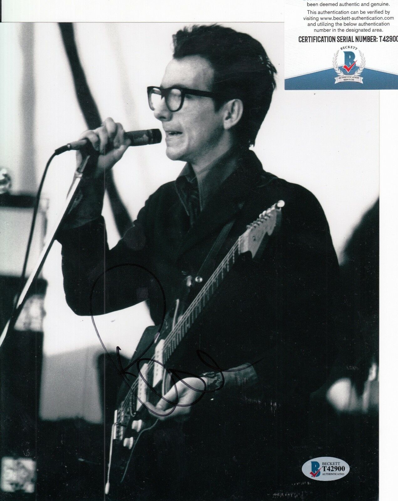 ELVIS COSTELLO signed (WATCHING THE DETECTIVES) 8X10 Photo Poster painting BECKETT BAS T42900