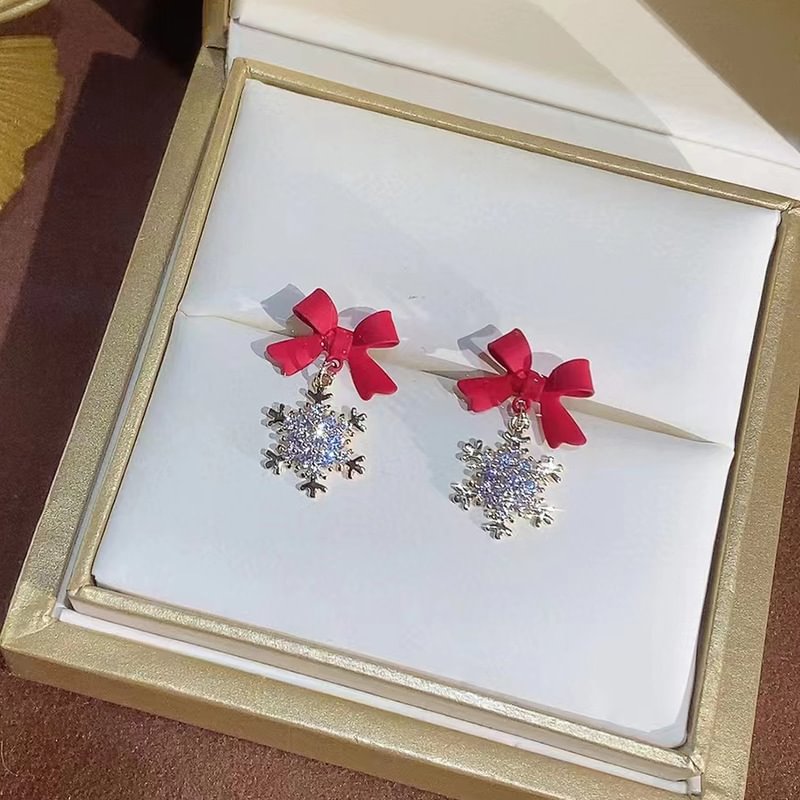 Snowflake bow earrings