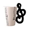 Mug en c&eacute;ramique avec anse en forme d'instrument de musique