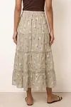 Back view of floral tiered summer skirt showing elasticated waistband and flowing A-line silhouette