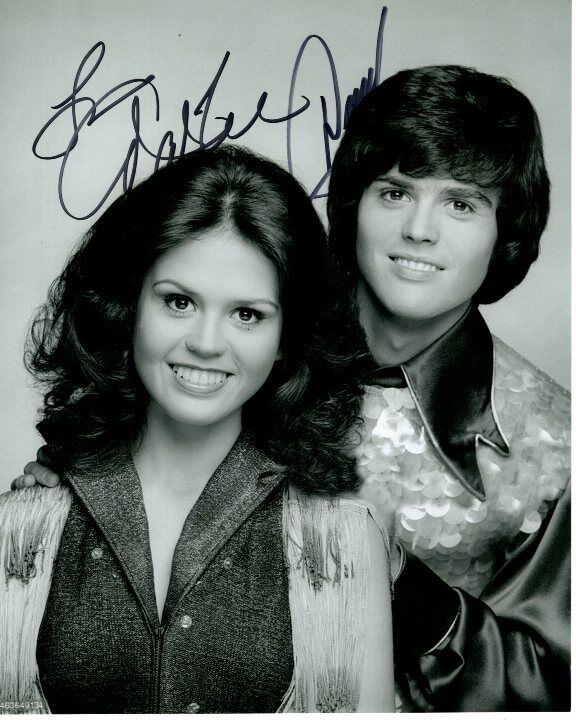 DONNY and MARIE OSMOND signed autographed 8x10 Photo Poster painting