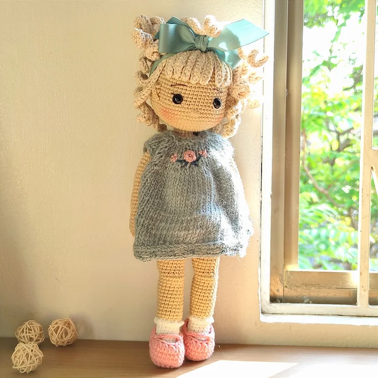 Customized crochet doll with removable clothing