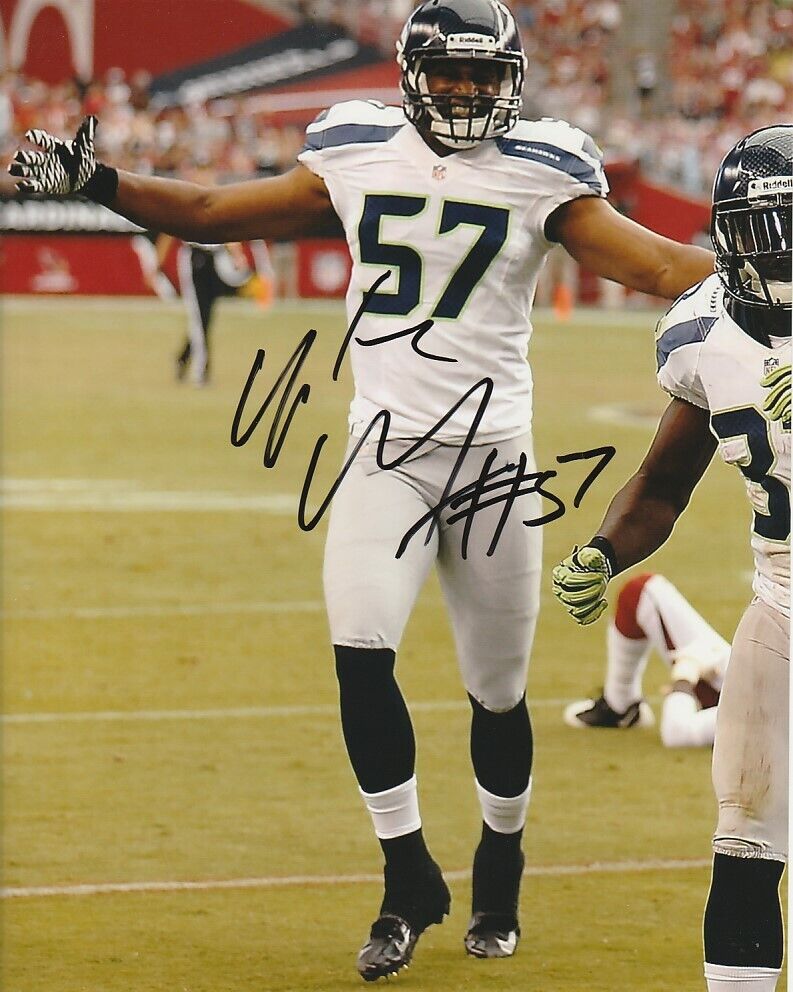 MIKE MORGAN SIGNED SEATTLE SEAHAWKS FOOTBALL 8x10 Photo Poster painting #1 NFL AUTOGRAPH