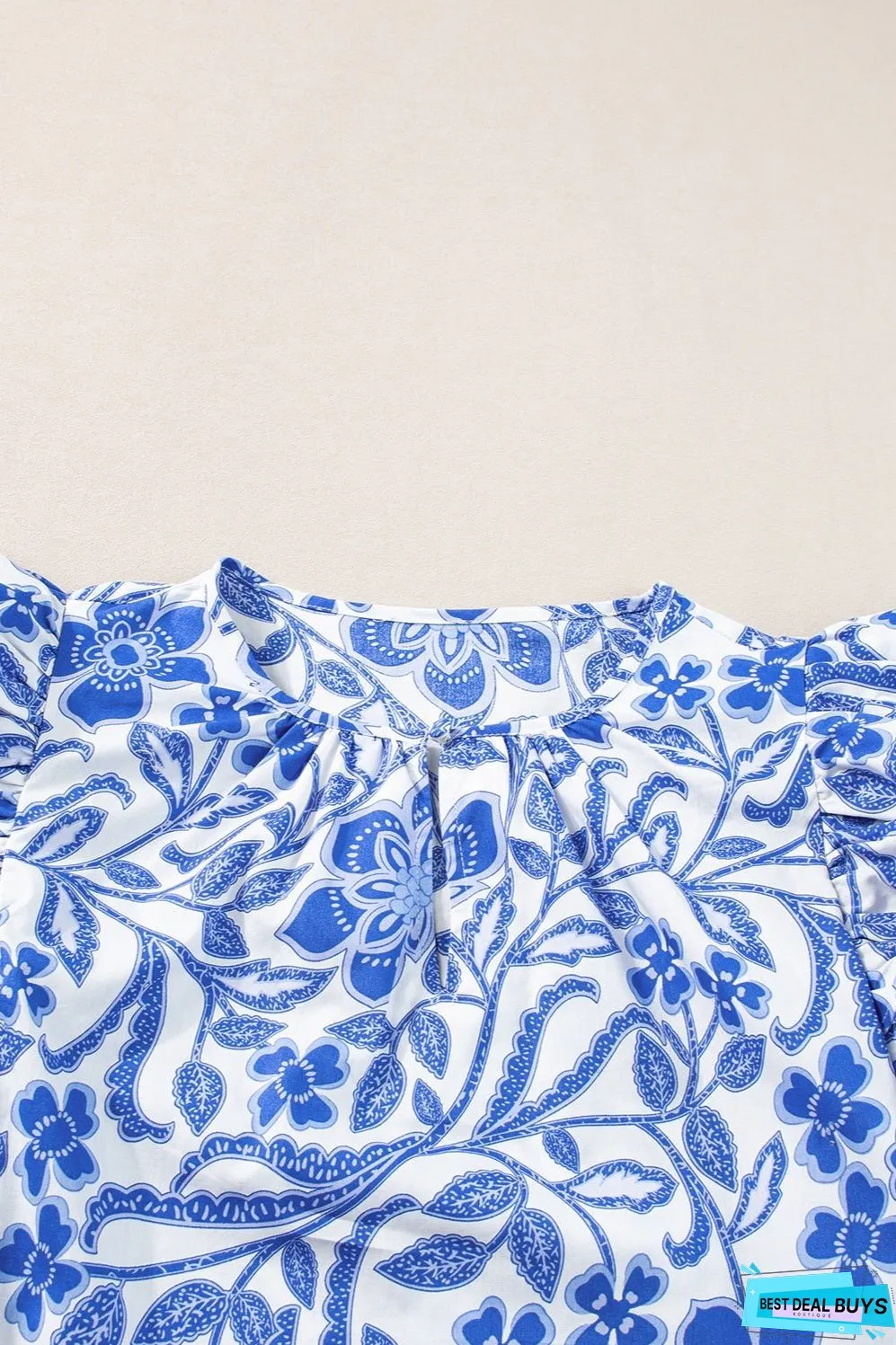 Printed Notched Half Sleeve Blouse