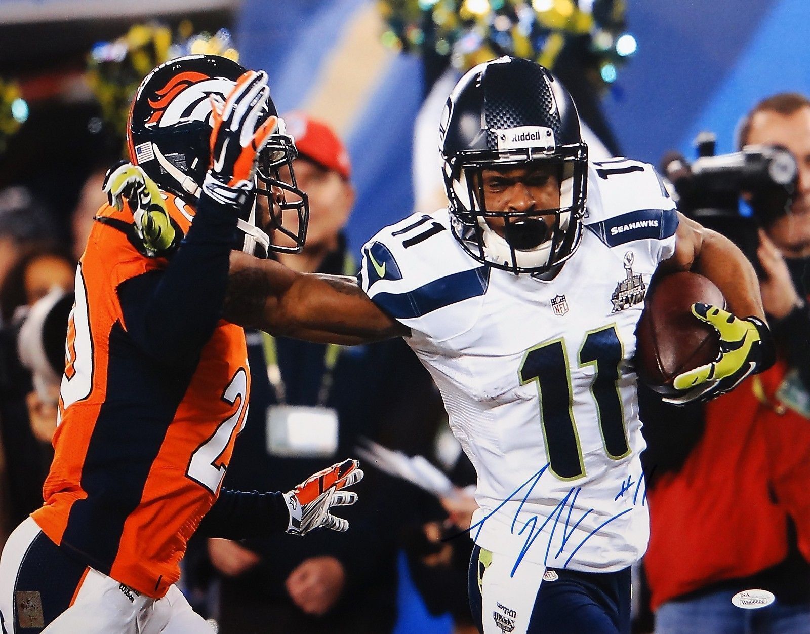 Percy Harvin Autographed 16x20 Super Bowl Stiff Arm Photo Poster painting- JSA W Authenticated