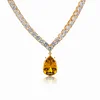 18K Yellow Gold 32.5 ct tw 4mm Tennis Necklace with A Pear Brazilian Natural Citrine