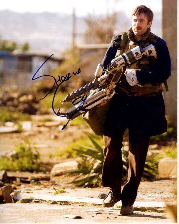 SHARLTO COPLEY Signed Autographed DISTRICT 9 WIKUS VAN DE MERWE Photo Poster painting