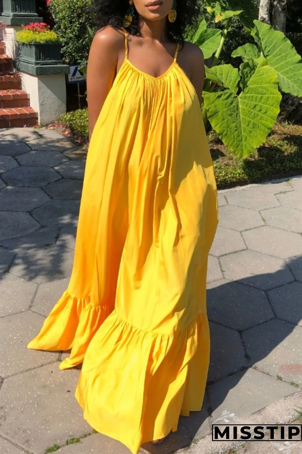Yellow Sexy Casual Solid Backless Spaghetti Strap Loose Sling Dress