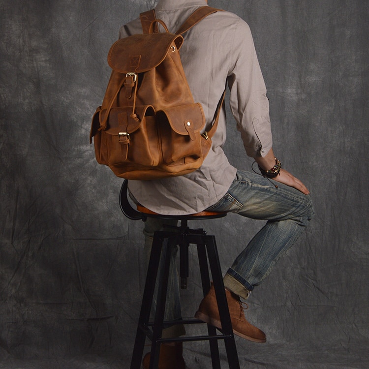 Model Show of Woosir Women Men Genuine Leather Vintage Backpack