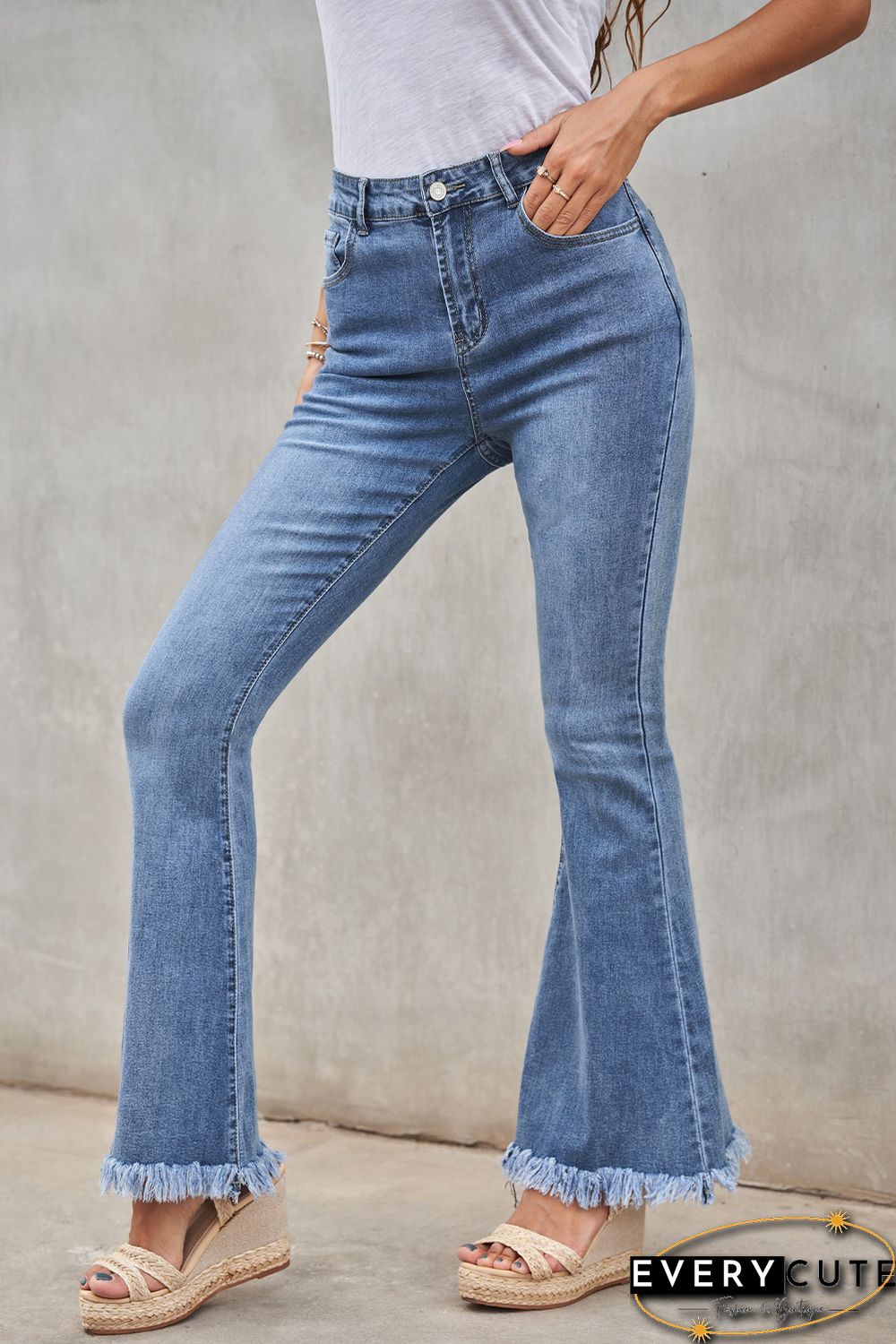 Medium Washed High Waist Flare Jeans with Raw Edges