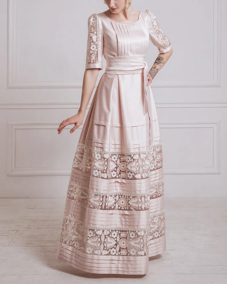 lace-paneled satin gown