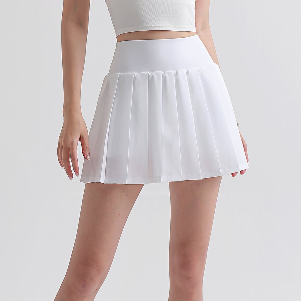 White Shop women's pleated sports tennis skirt with lining lycra pockets shorts online on Hergymclothing