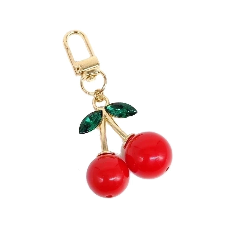 Elegant Glam Lady Fruit Alloy Plating Metal Inlay Resin Glass Stone Bag Pendant Keychain