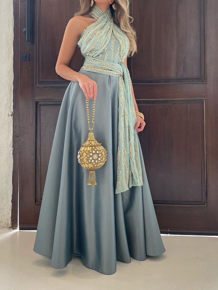 Gold fringed light blue satin halterneck dress فساتين