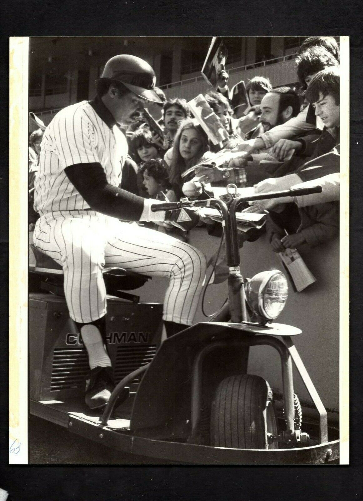 Reggie Jackson signs for fan Louis Requena Press Original Photo Poster painting New York Yankees