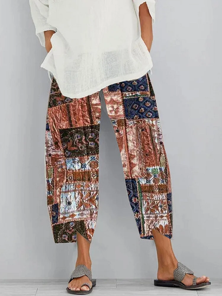 Fashion loose irregular rendering printed elastic waist pocket pants