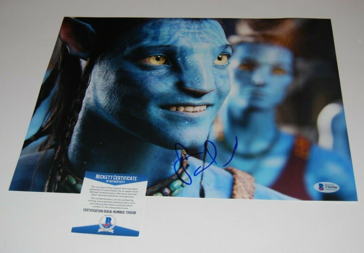 SAM WORTHINGTON signed (AVATAR) autographed *Jake Sully* 8X10 BAS BECKETT T56506