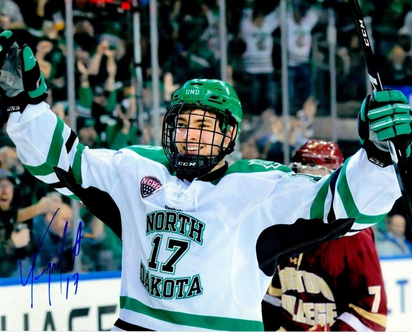 TYSON JOST autographed SIGNED NORTH DAKOTA FIGHTING HAWKS SIOUX 8X10 GOAL Photo Poster painting