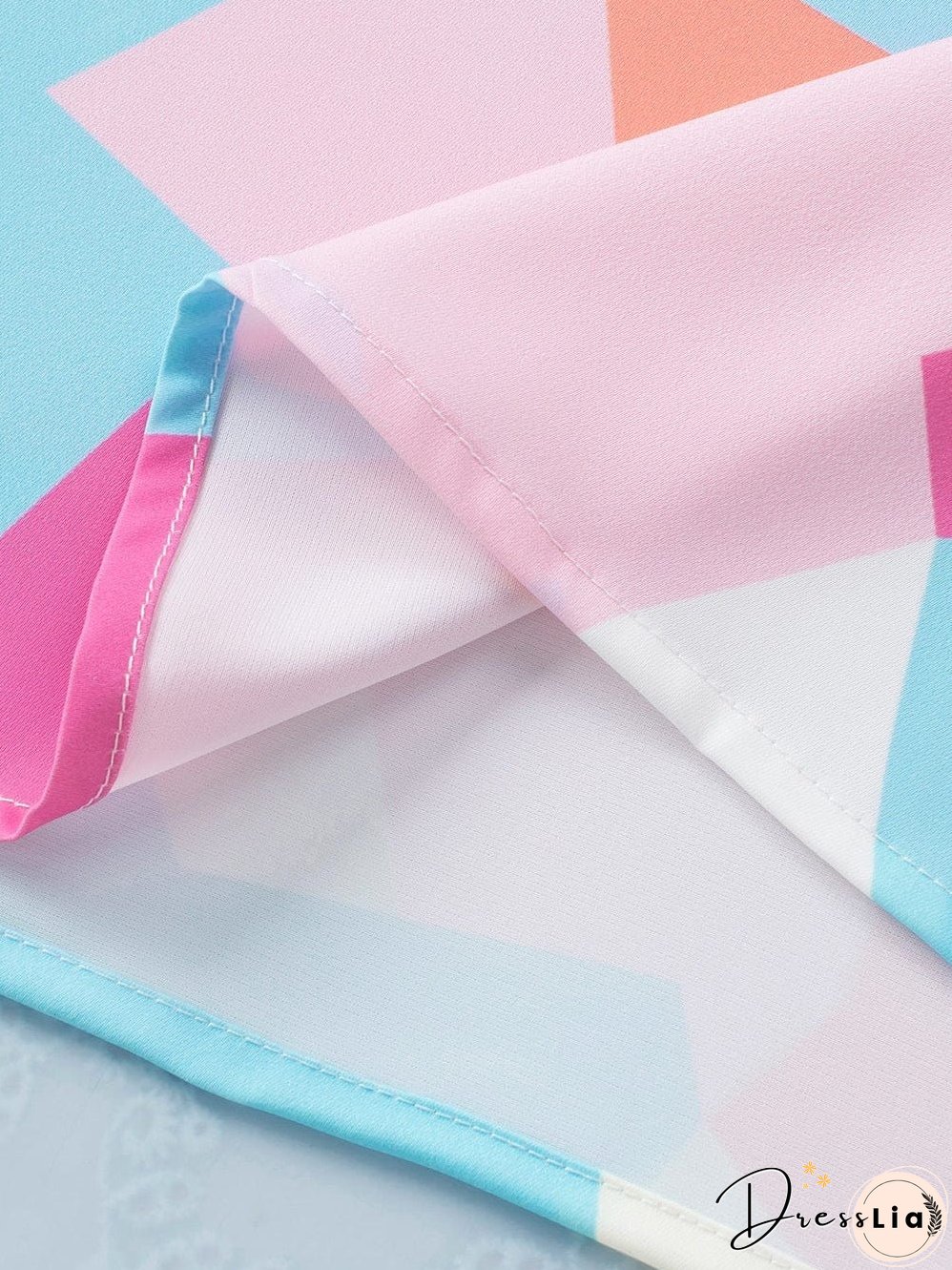 Pastel Geometric Print V-Neck Cap Sleeve Top with Colorblock Detail