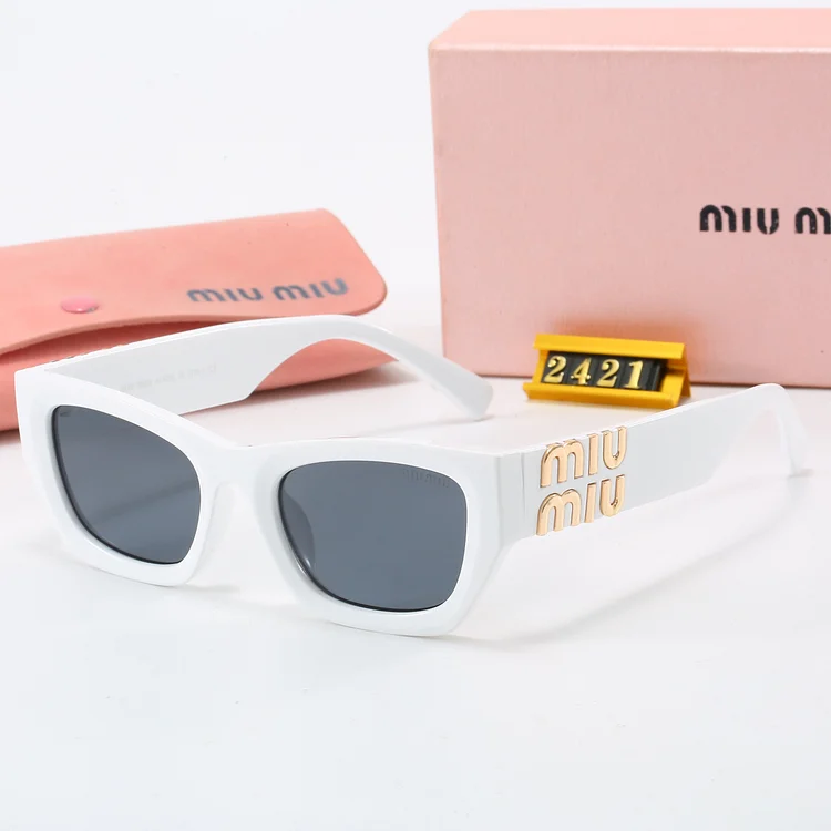 Sunglasses - Miumiu