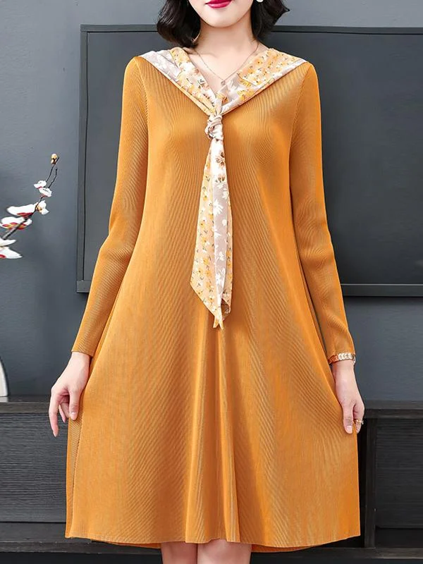 Elegant long-sleeved mid-length loose pleated dress