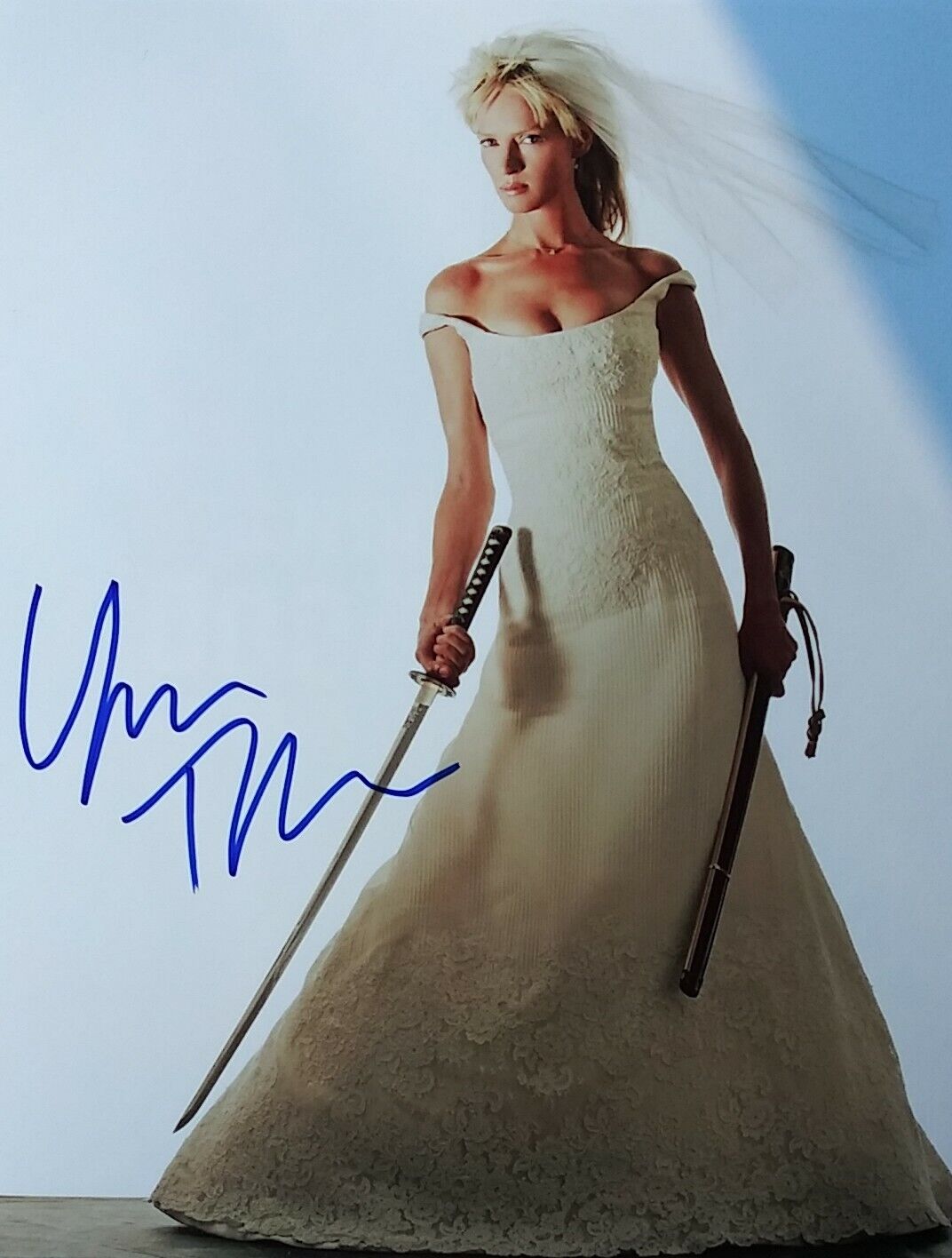 Uma Thurman signed 8 x 10