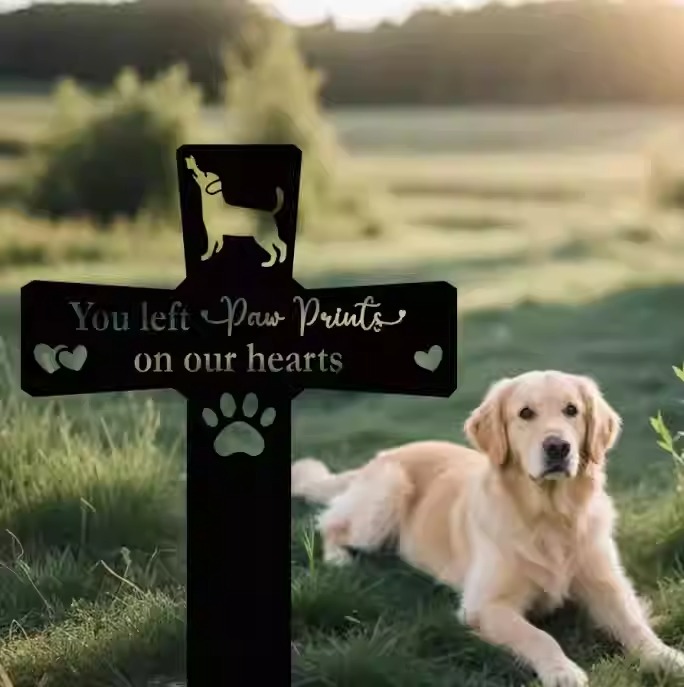 Close-up of laser engraved pet memorial plaque with paw print design