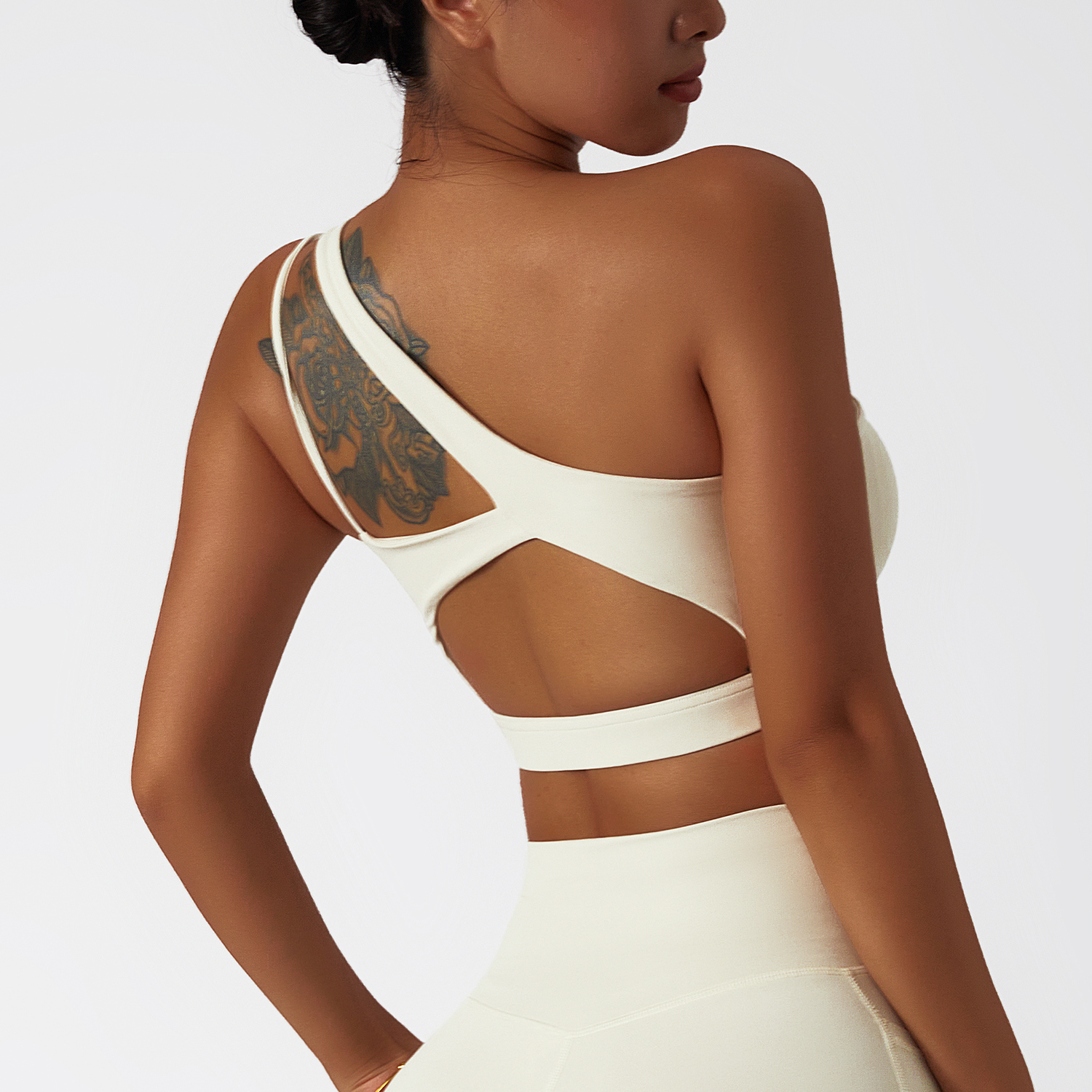 Buy different colors and types of oblique single shoulder anti slip open back running gym fitness sports bra on Hergymclothing
