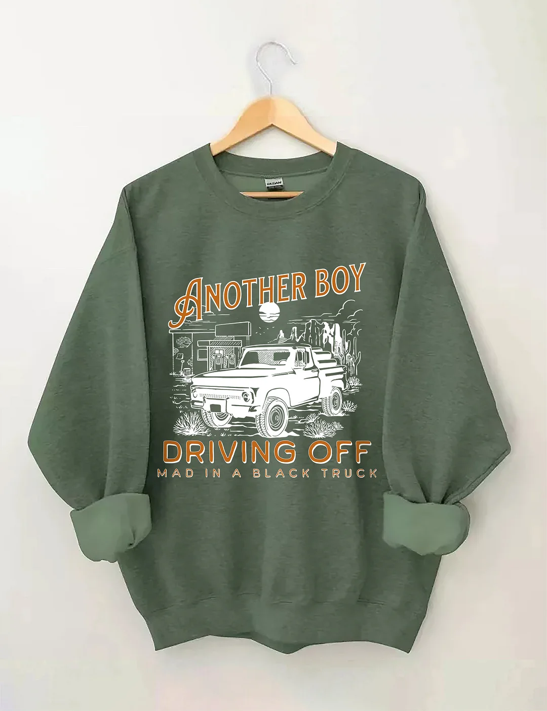 Boy Driving Off Mad Black Truck Sweatshirt