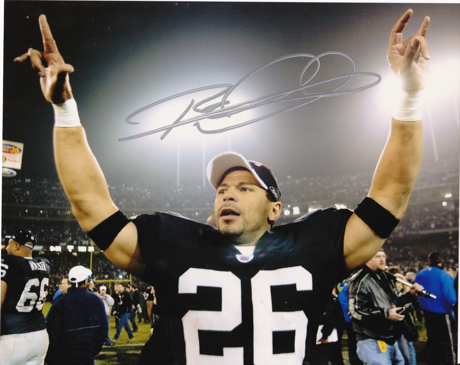 ROD WOODSON OAKLAND RAIDERS ACTION SIGNED 8x10