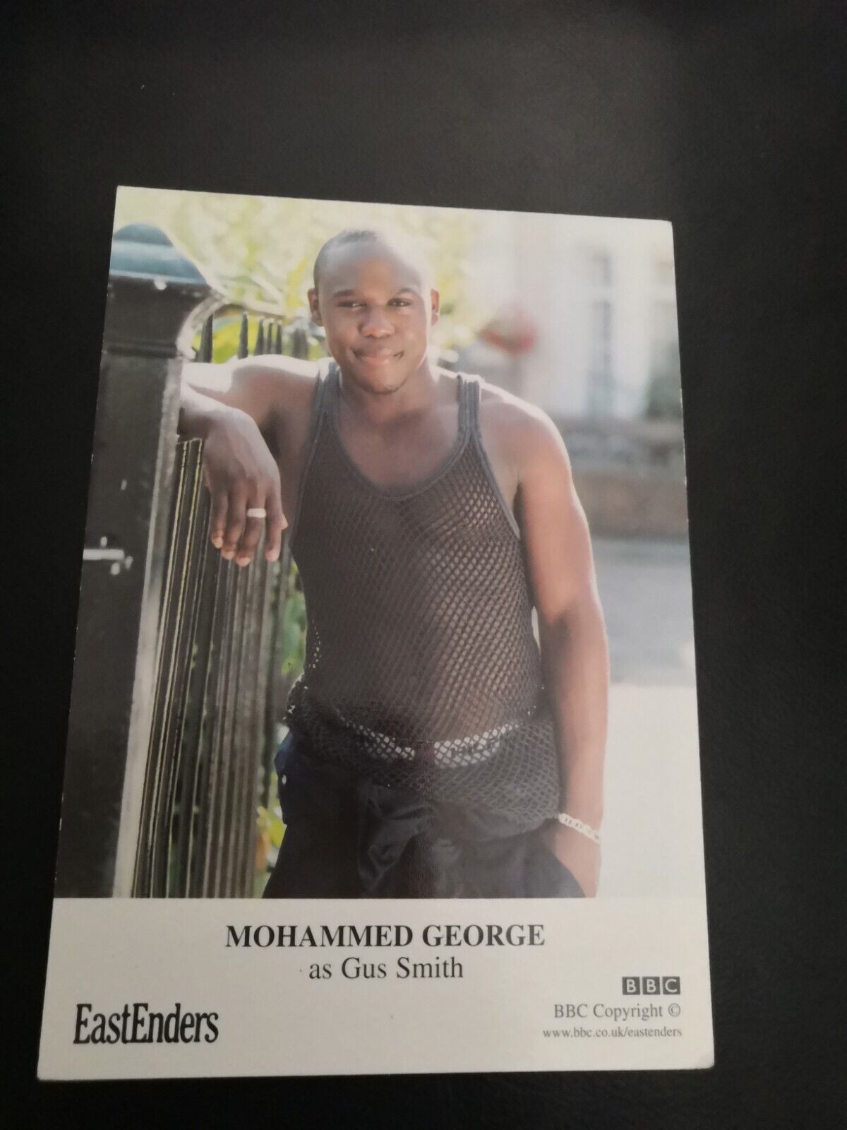 EASTENDERS UNSIGNED CAST CARD OF MOHAMMED GEORGE