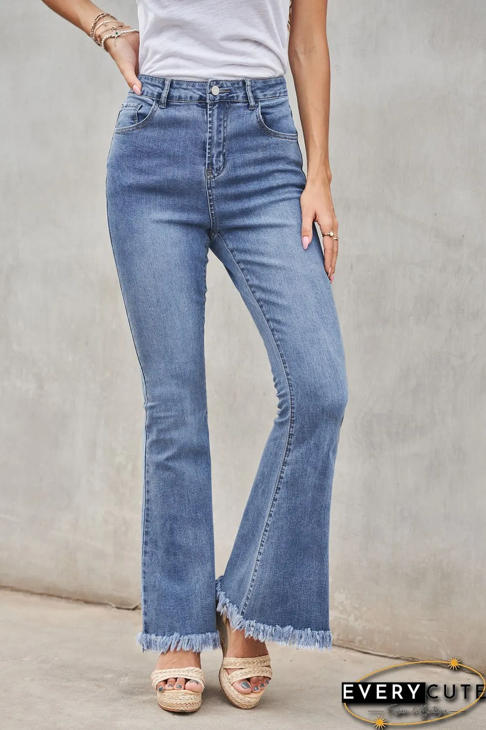 Medium Washed High Waist Flare Jeans with Raw Edges