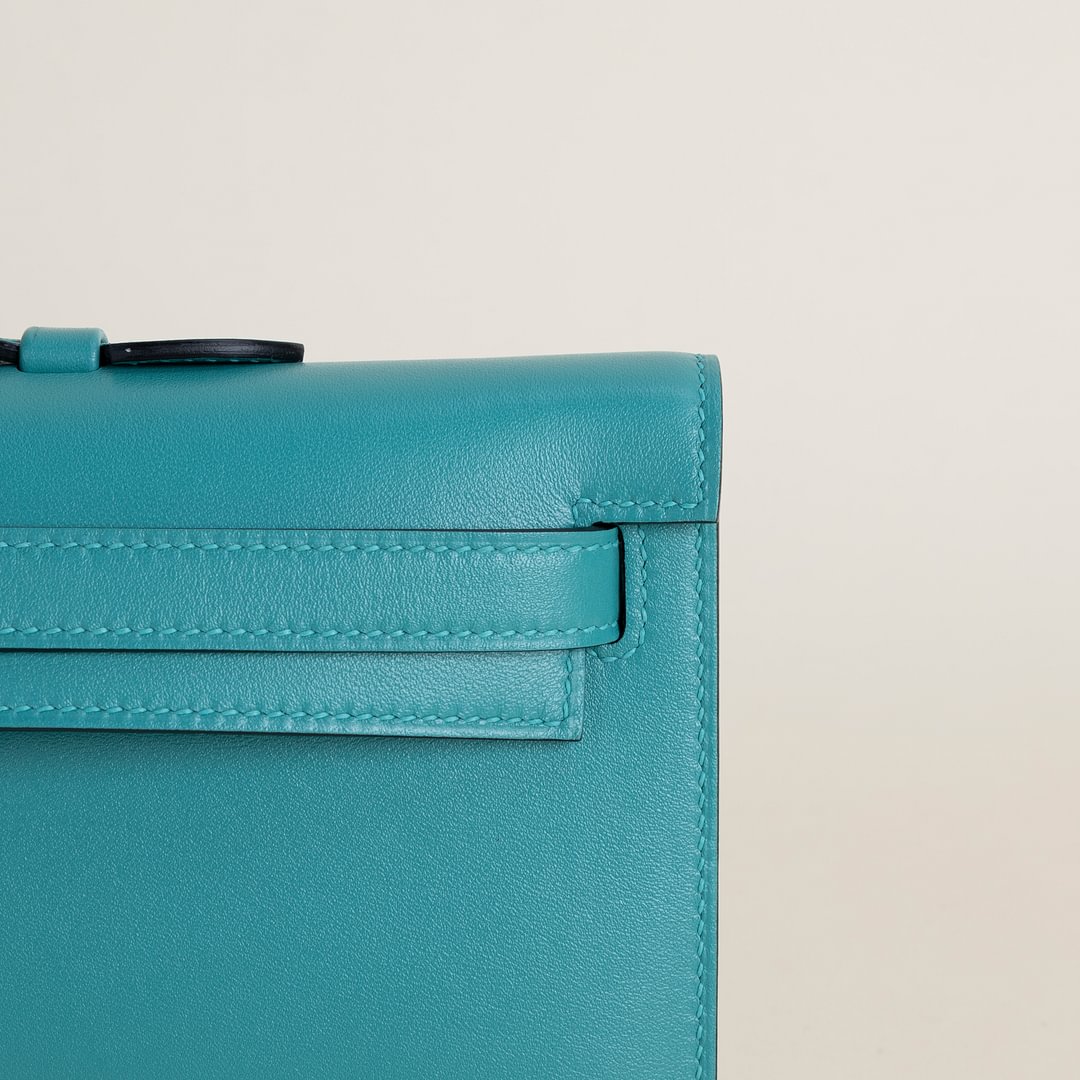 Kelly cut  Swift 7F Blue Paon GHW