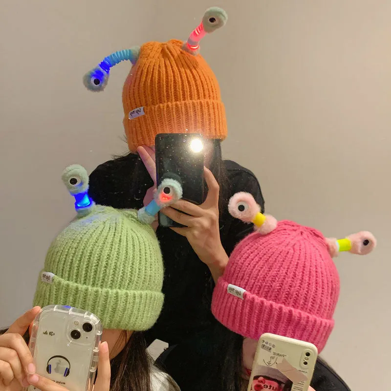 Bonnet aux yeux de monstre brillants