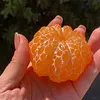 Hand-carved orange shape from pure natural jade - a collectible item
