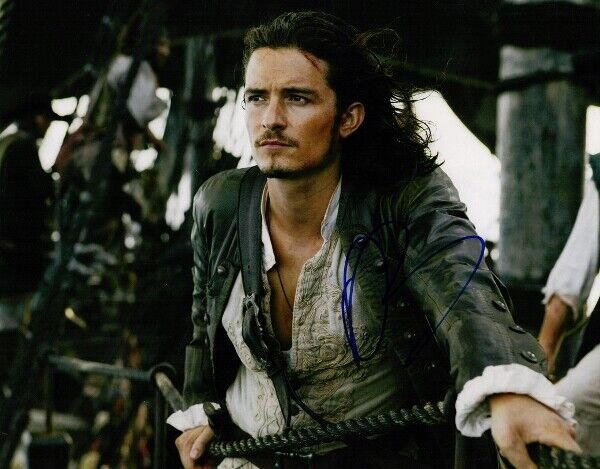 Orlando Bloom Signed - Autographed Pirates of the Caribbean 11x14 inch Photo Poster painting COA