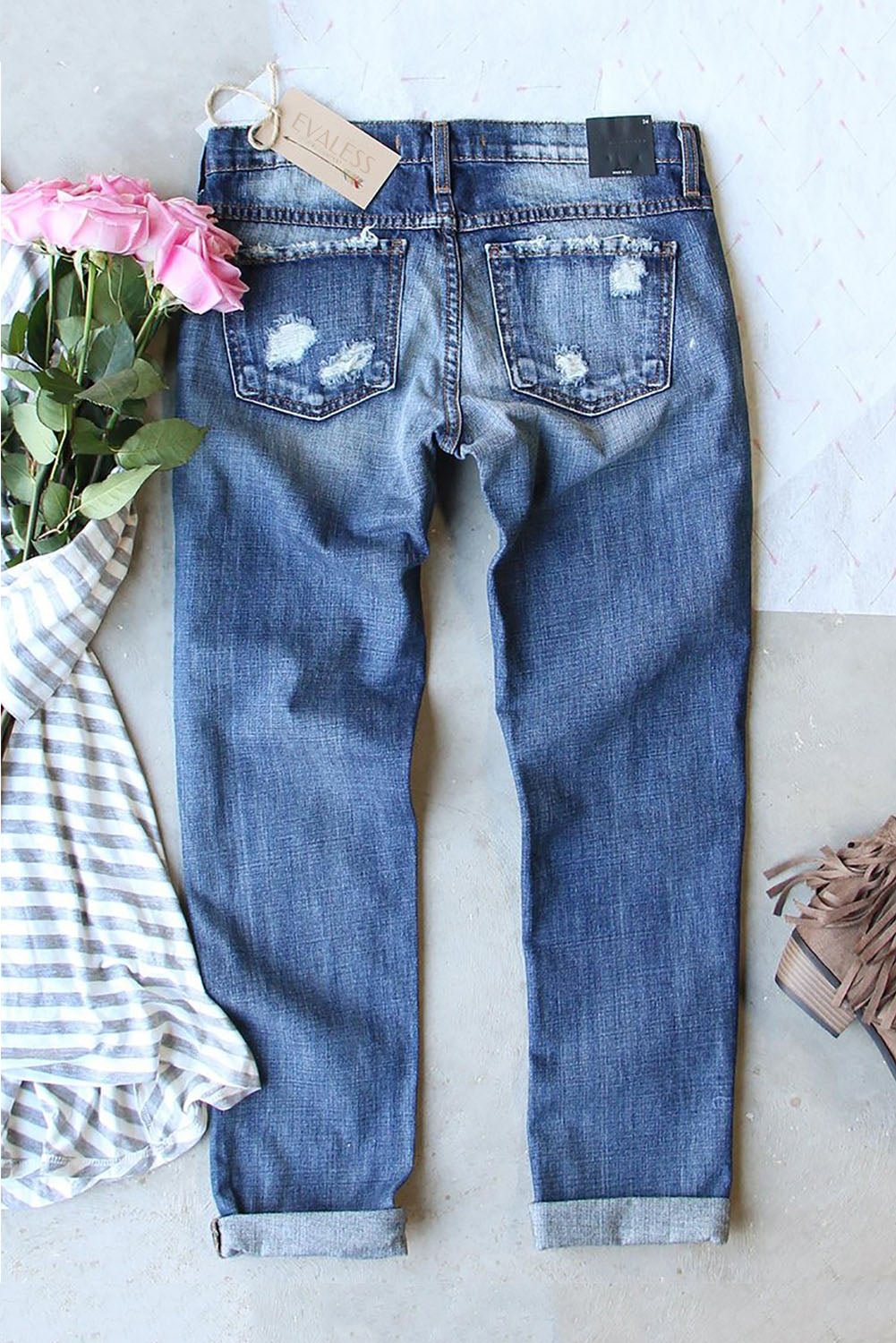 jeans with cow print pockets