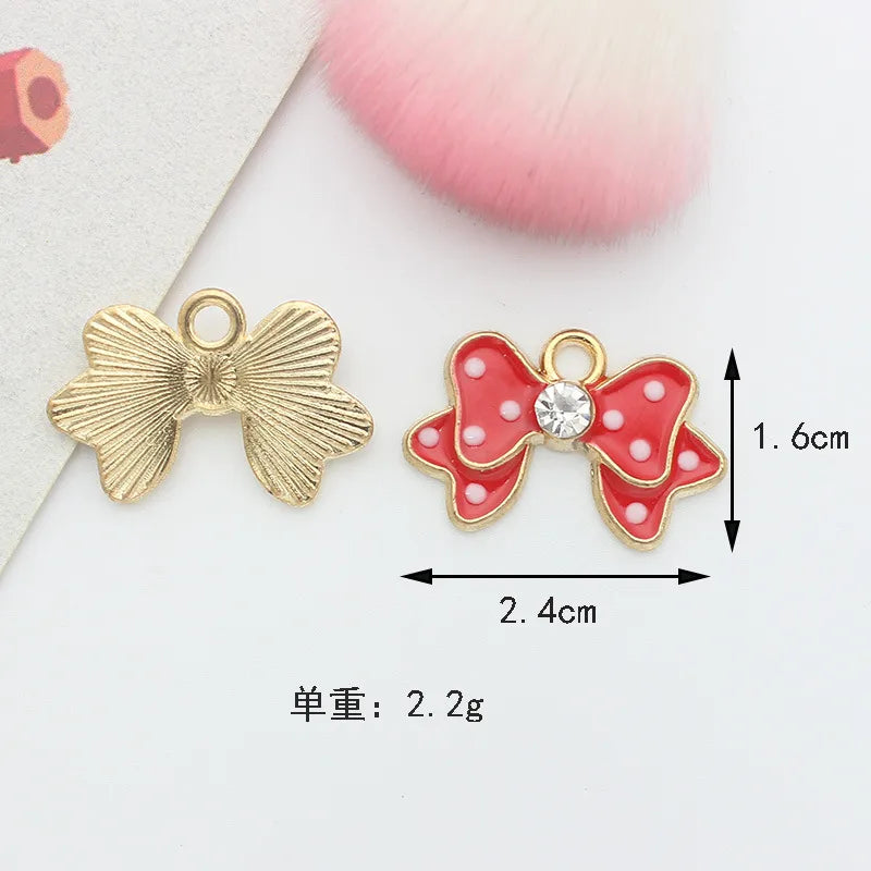 10 PCS/Package 1.5 * 20mm 14 * 14mm 7 * 12mm Alloy Rhinestones Pearl Number Heart Shape Bow Knot Polished Pendant