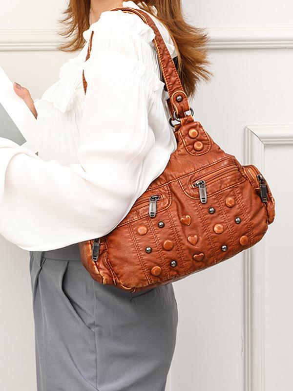 Heart Studded High Capacity Washed Leather Bag