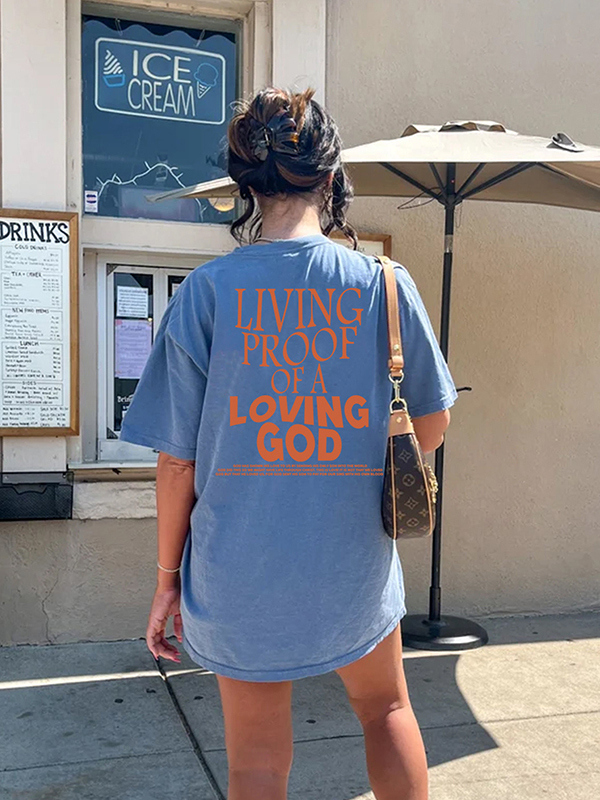 LIVING PROOF OF LOVING GOD UNISEX COTTON T-SHIRT